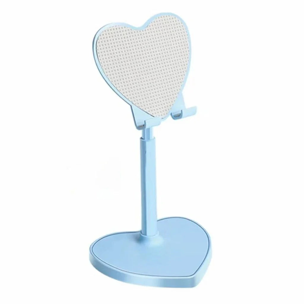 A light blue stand with a heart-shaped phone stand featuring a textured, dotted reflective surface, set against a plain white background.