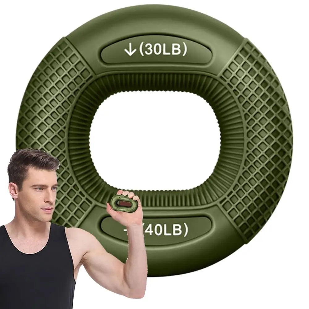 Green resistance ring with weight markings held by a person on a white background