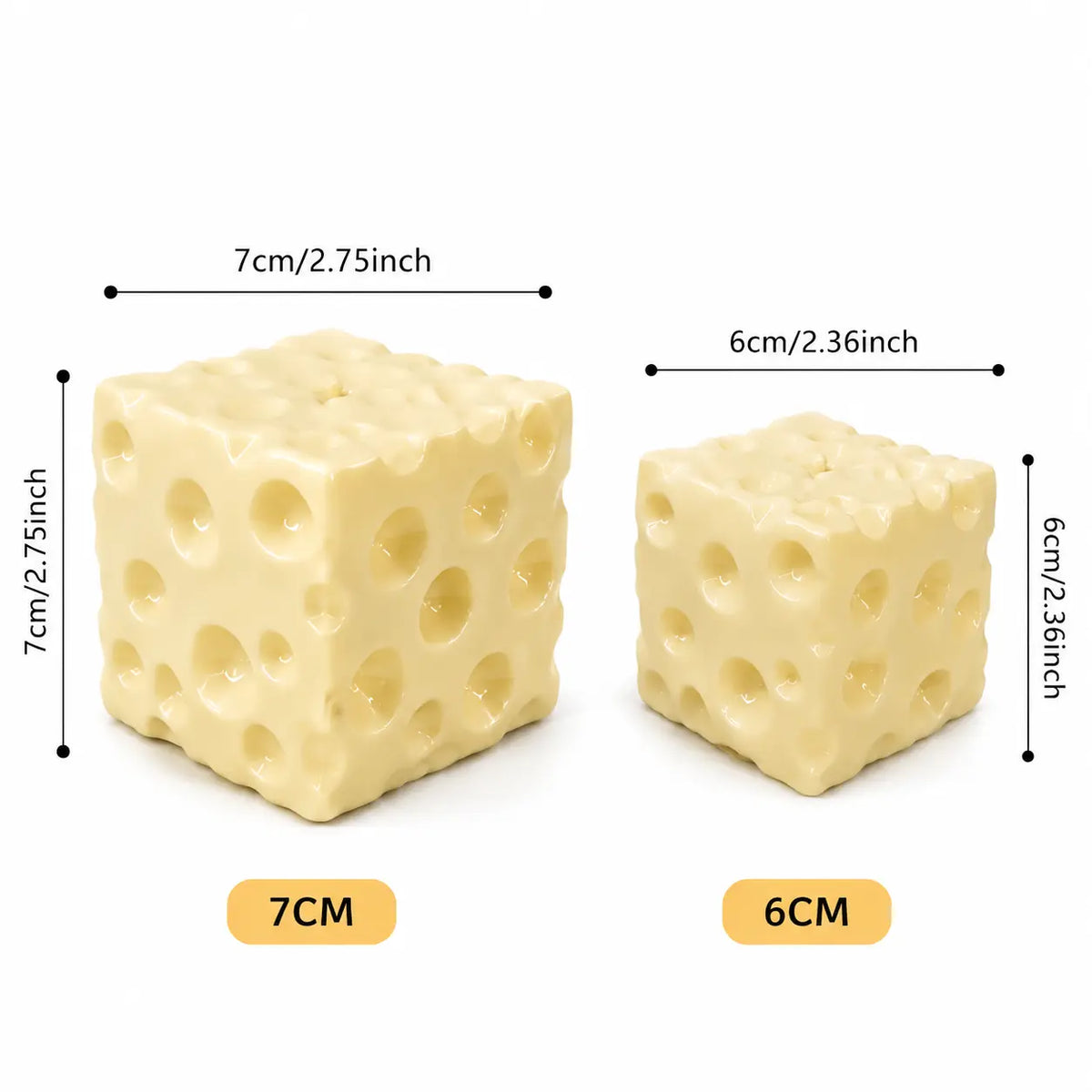 Two cheese-shaped cube Squishes shown with dimension labels indicating 7 cm by 7 cm and 6 cm by 6 cm on a white background.