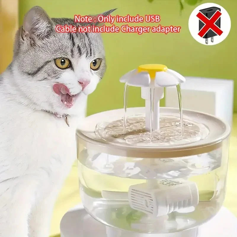 Cat interacting with a pet water fountain with a USB cable included.